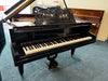 Pleyel 160cm grand piano in polished ebony with fretwork music desk