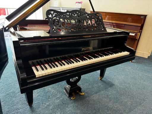 Pleyel 160cm grand piano in polished ebony with fretwork music desk